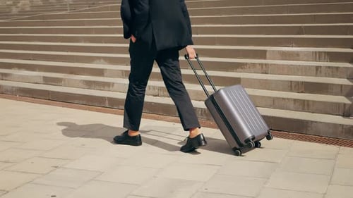 Tourist Man with Suitcase Baggage in Spain A Traveler with Luggage Suit Jacket on Business Street Go