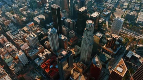 Flight above the roofs of the buildings in the downtown of densely populated metropolis.