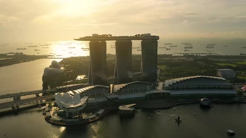 Drone Aerial view 4k Footage of Singapore City Skyline at Marina Bay ,Singapore on sunrise
