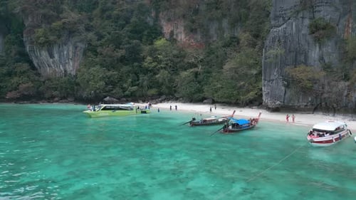 Coast Bay with Parked Boats By Beach Bunch of People on Beach Busy Beach Filled with Tourists