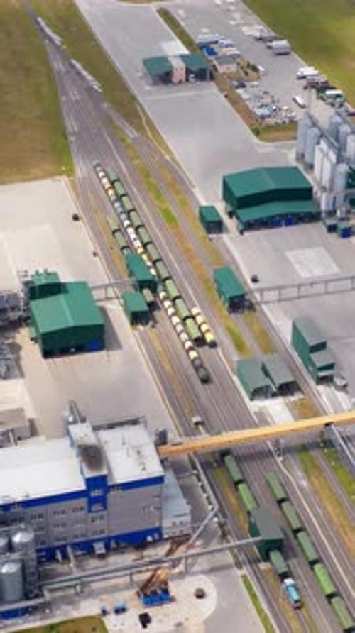 Contemporary agriculture complex. View from above on industry with large storage bins