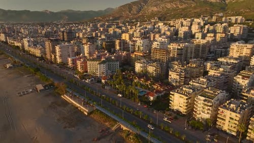 Aerial View A Beautiful Coastal Villa Complex Features a Sparkling Pool Surrounded By Vibrant Green
