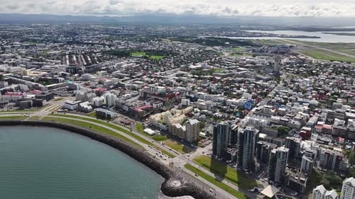 Reykjavik, Iceland, Aerial View of Downtown Buildings and Coastal Traffic, High Rise Drone Shot