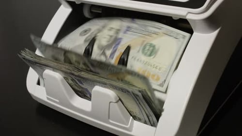 Counting Hundred Dollar Bills Money Counting Process Business and Finance Cash Counting Machine in