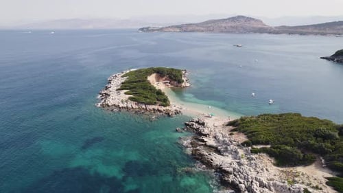 Stunning tropical white beach on remote Ksamil Islands, Albania; drone