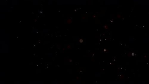 Abstract Particles Moving on Dark Background