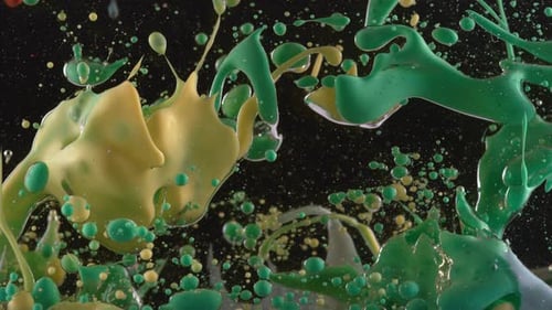 Colorful paint explosion with green and yellow