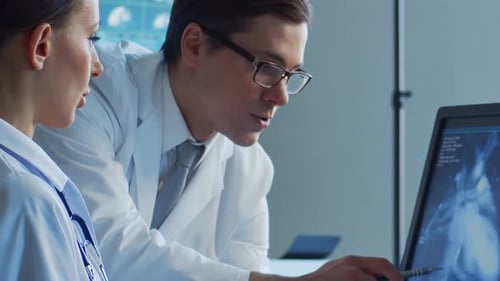 Professional Medical Doctors Working in Hospital Office Making Computer Research Medicine Healthcare