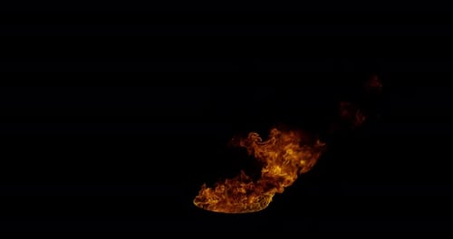 Ignite Sammlung: Mittelgroße Flammen fallen aus einem Fass in der Mitte auf einem dunklen Hintergrund, aufgenommen in