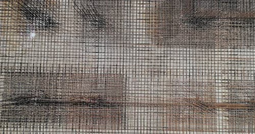 Aerial View of Construction Site with Steel Rebar Grid