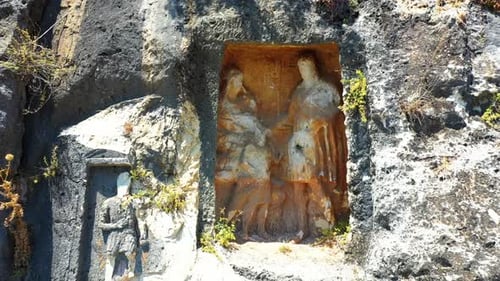 Ancient Carvings in Rock Wall, Historical Site