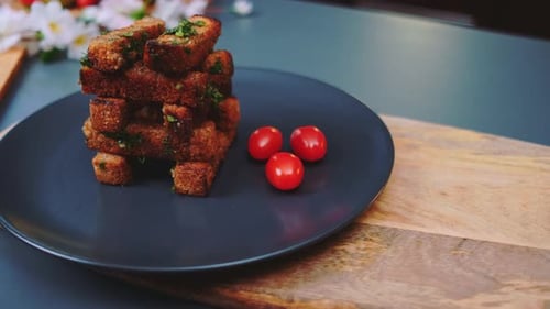 Toasted Bread Cubes Stacked High with Tomatoes