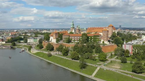 Drone Flies Forward Toward Wawel Royal Castle in Krakow, Poland