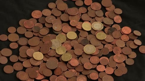 Pile of Bronze and Gold Colored Coins