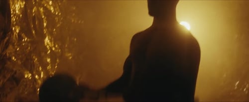 Silhouetted Man Weightlifting With Barbell