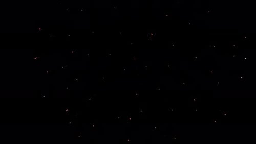 Bright exploding color of red, gold, blue and green against the black night sky. Fireworks light up