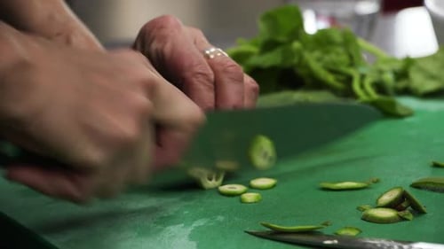 Slicing zucchini with a knife