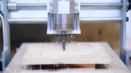 Cutting Machine Tool Makes Hole in Wooden Part in Shop