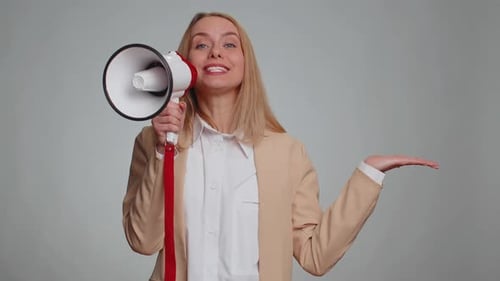 Woman Talking with Megaphone Proclaiming News Loudly Announcing Advertisement Pointing Empty Place