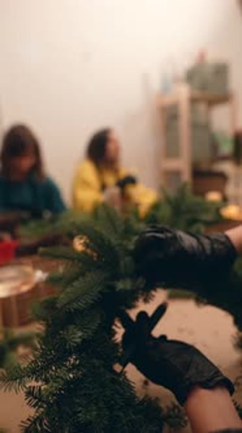 Vibrant Workshop Where Women Assemble Seasonal Decorative Wreaths