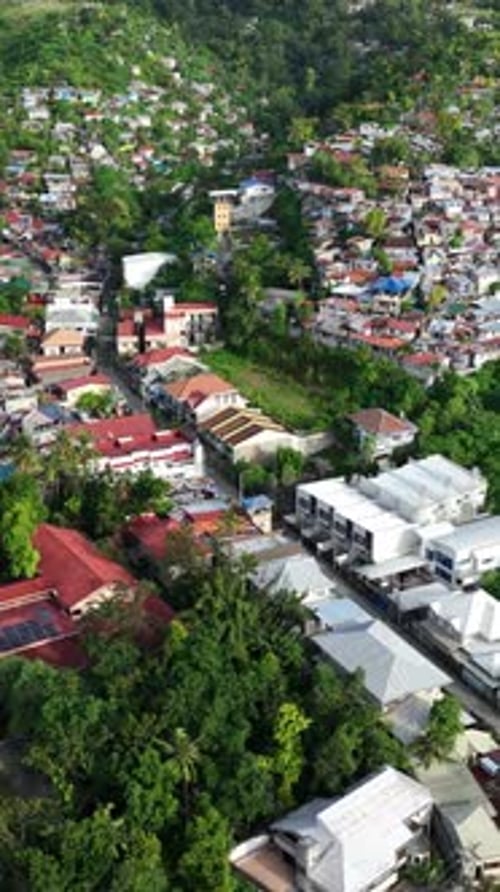 Aerial shot of Cebu City in the Philippines. Vertical Video.