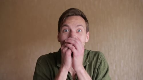 Man Expressing Joy and Surprise Close Up