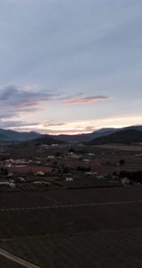 Vertical Drone Hyperlapse Over Usero Fields and Mountains