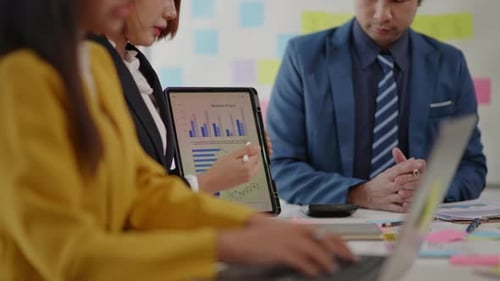 Team Discussing Business Project in Office Environment