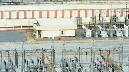 A high voltage power station from above by aerial view drone.
