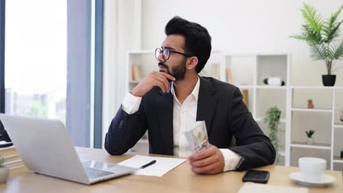 Businessman Counting Cash