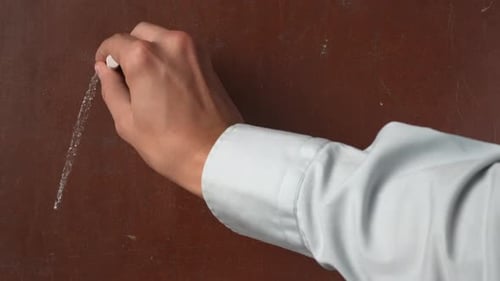 Textured Brown Chalkboard Background Male Hand Writing A B C First Letters of Alphabet on the Board