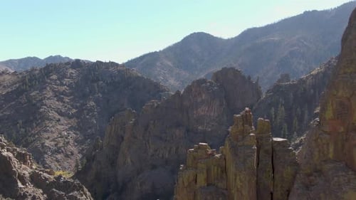 Drone shot soaring over the barren Rocky Mountains in Colorado.