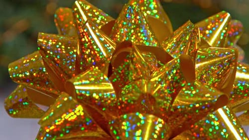 Shiny Gold Polka Dot Holiday Bow Rotating