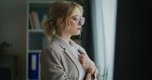 Sad Businesswoman Sighs in Despair