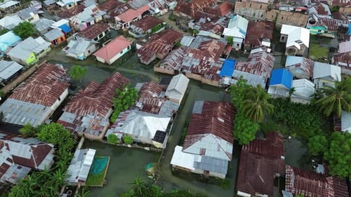 Aerial View from above on the flooded houses and the city