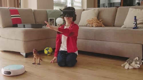 Boy Wearing VR Headset Interacting with Virtual World
