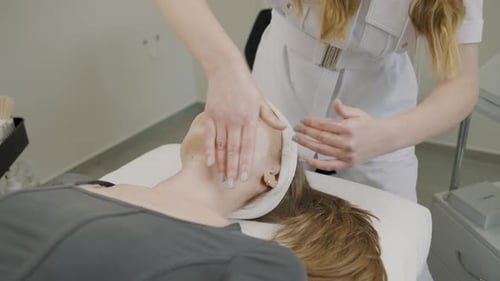 Cosmetology transformation with permanent makeup in a beauty studio