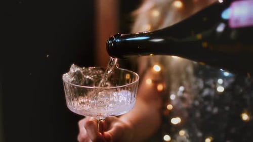 Champagne Pouring into Glass for Celebration Event