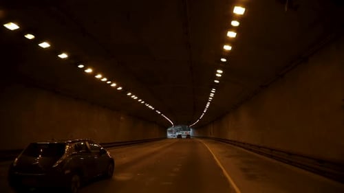 Tunnel with cars driving through