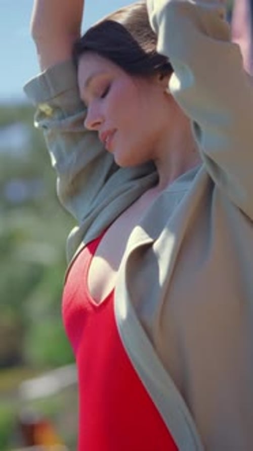 Brunette Woman Posing Wearing Blazer in Urban Setting