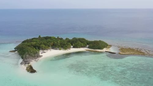 Aerial view of beautiful Maldives island. Tropical beach white sand, blue Indian Ocean palm trees. V
