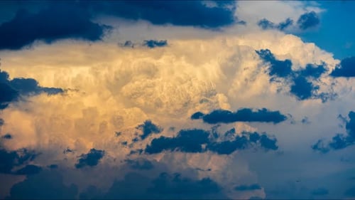 Cumulus Clouds Rising In Warm Afternoon Air Before Thunderstorm Forms