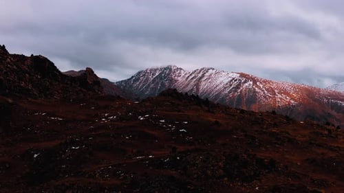 Majestic Pyrenees mountains at dusk with snow-covered peaks