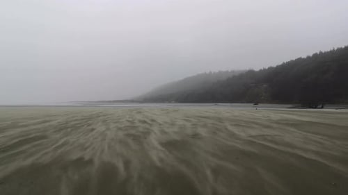 Strong storm winds blowing over the beach -slowmo
