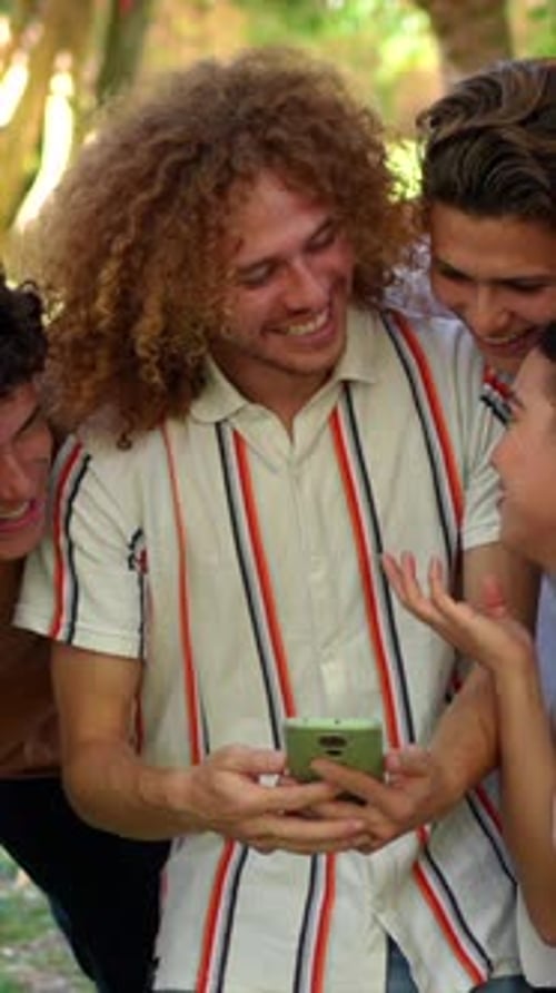 Multiethnic Students Taking Selfie Celebrating Party in a Park