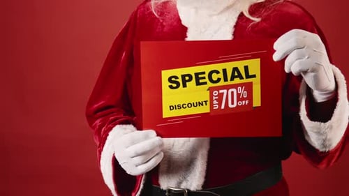 Santa Claus Holding Christmas Special Discount Sign