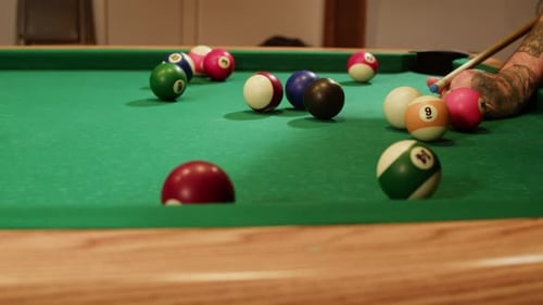 Young Man Playing American Billiard Pool Poule Closeup Colorful Balls on Green Billiards Table