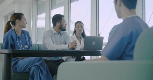 Healthcare Professionals in Meeting in Office