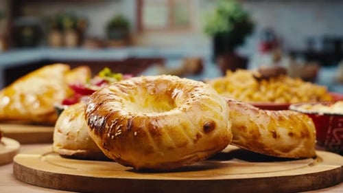 Delicious Food Arrangement on Wooden Board in Kitchen