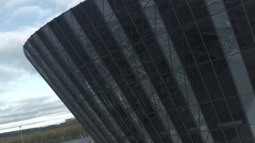 Facade of Glass Circular Building with Reflection Stock Footage Top View of Glass Building with